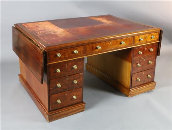 A Victorian mahogany twin-pedestal partners desk